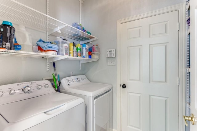 laundry area featuring laundry area and washing machine and dryer