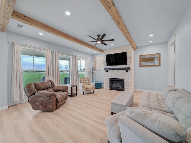living area with recessed lighting, ceiling fan, beam ceiling, and wood finished floors