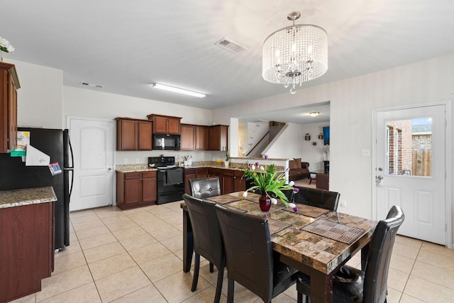 1320 Corkwood Dr, Princeton, TX 75407 - dining space featuring visible vents, light tile patterned floors, stairway, and an inviting chandelier