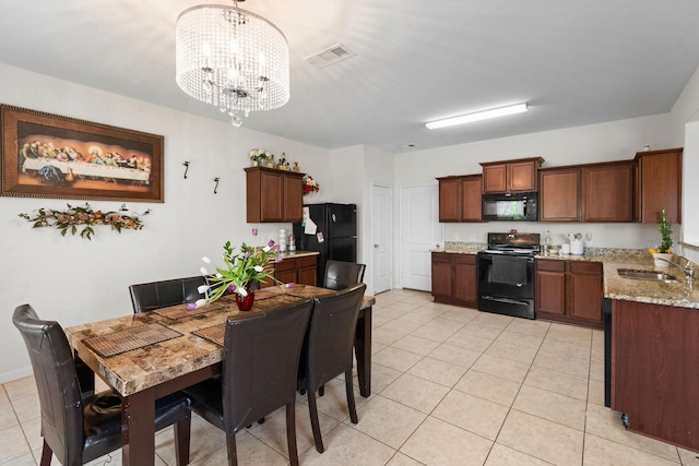 1320 Corkwood Dr, Princeton, TX 75407 - dining space featuring light tile patterned floors, visible vents, and a chandelier
