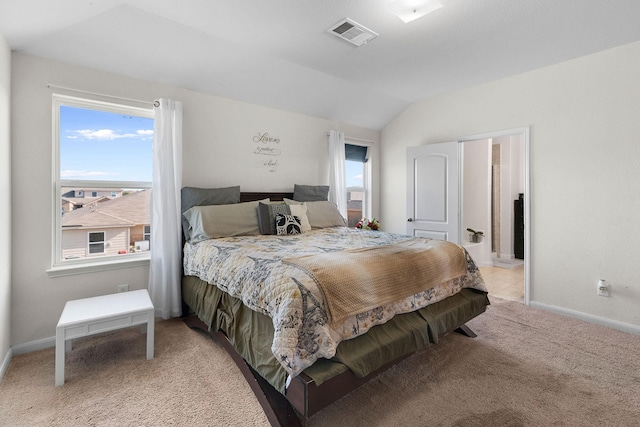 1320 Corkwood Dr, Princeton, TX 75407 - bedroom featuring light colored carpet, baseboards, vaulted ceiling, and visible vents