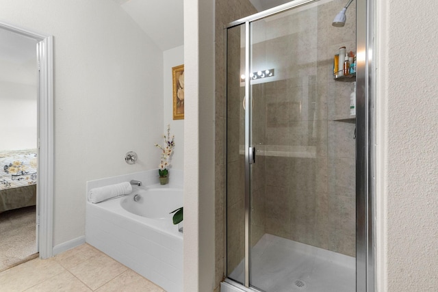 1320 Corkwood Dr, Princeton, TX 75407 - ensuite bathroom featuring tile patterned floors, a shower stall, ensuite bath, and a bath
