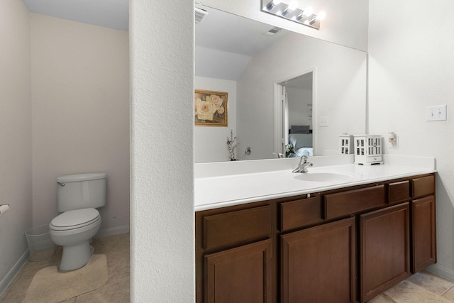 1320 Corkwood Dr, Princeton, TX 75407 - ensuite bathroom featuring vanity, ensuite bath, toilet, baseboards, and lofted ceiling