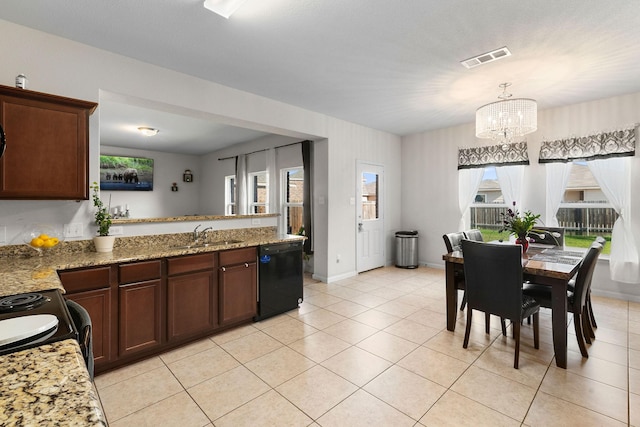 1320 Corkwood Dr, Princeton, TX 75407 - interior space featuring visible vents, baseboards, light tile patterned floors, and a chandelier