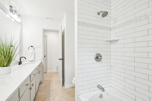 full bath with vanity, toilet, tile patterned floors, tub / shower combination, and visible vents