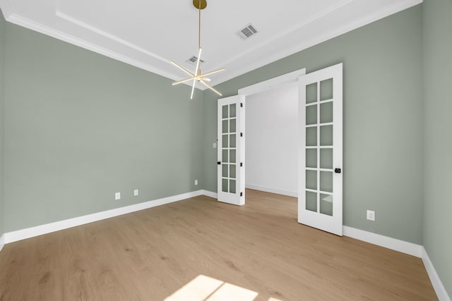17546 Sequoia Dr, Dallas, TX 75252 - unfurnished room featuring baseboards, ornamental molding, french doors, and a notable chandelier