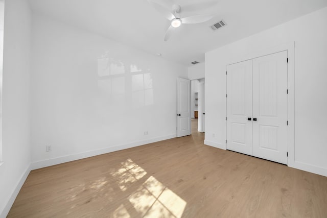 17546 Sequoia Dr, Dallas, TX 75252 - unfurnished bedroom featuring baseboards, visible vents, light wood-style flooring, and a closet