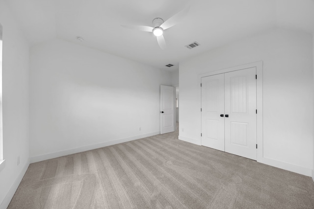 17546 Sequoia Dr, Dallas, TX 75252 - unfurnished bedroom with a closet, carpet flooring, lofted ceiling, and visible vents