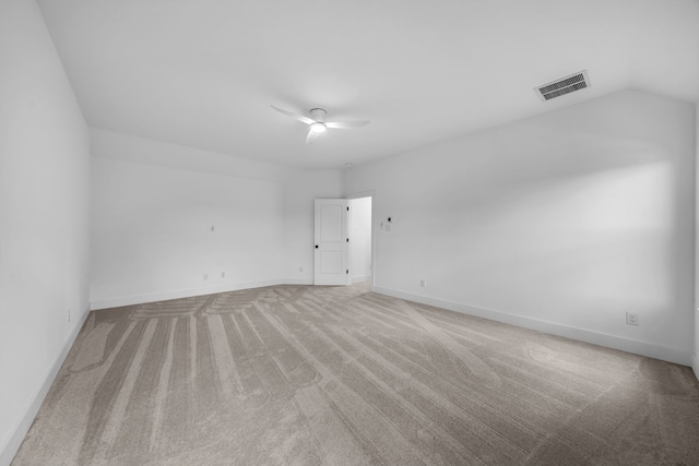 17546 Sequoia Dr, Dallas, TX 75252 - carpeted spare room featuring baseboards, ceiling fan, vaulted ceiling, and visible vents