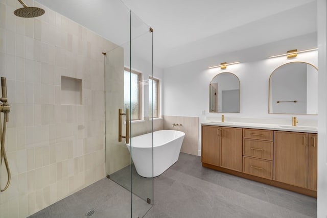 17546 Sequoia Dr, Dallas, TX 75252 - full bath with double vanity, walk in shower, a sink, and a soaking tub