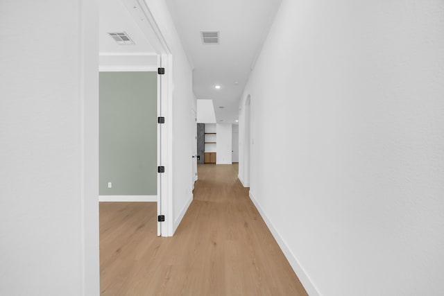 17546 Sequoia Dr, Dallas, TX 75252 - hallway featuring recessed lighting, baseboards, light wood finished floors, and visible vents