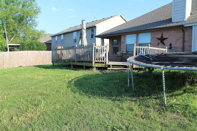 2005 Sumac Dr, Forney, TX 75126 - view of yard featuring a trampoline and a deck