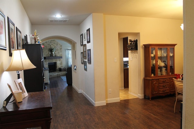 2005 Sumac Dr, Forney, TX 75126 - hall featuring wood finished floors, arched walkways, and baseboards