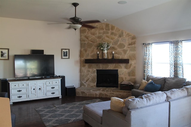 2005 Sumac Dr, Forney, TX 75126 - living area with lofted ceiling, a ceiling fan, a stone fireplace, and dark wood-style floors