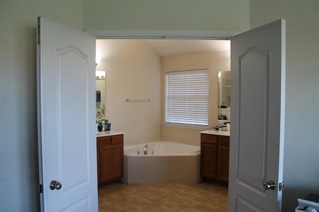 2005 Sumac Dr, Forney, TX 75126 - full bath featuring a garden tub, two vanities, and a shower
