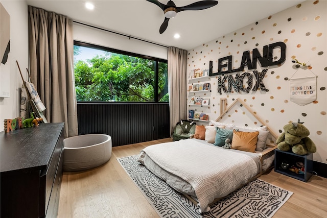 4280 Shorecrest Dr, Dallas, TX 75209 - bedroom with wallpapered walls, wood finished floors, ceiling fan, recessed lighting, and access to outside