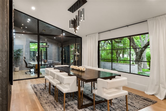 4280 Shorecrest Dr, Dallas, TX 75209 - dining room with light wood-type flooring, lofted ceiling, and recessed lighting