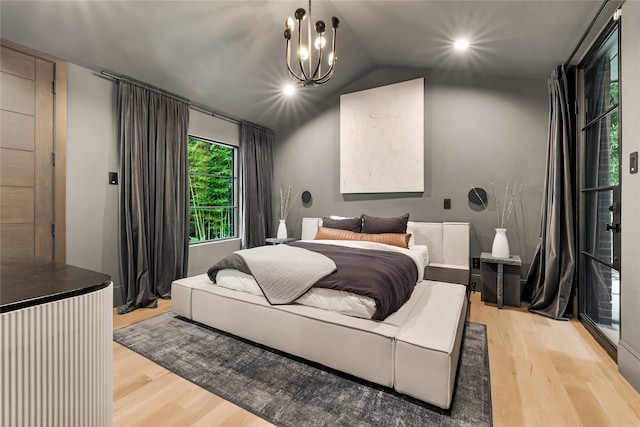 4280 Shorecrest Dr, Dallas, TX 75209 - bedroom featuring light wood-style flooring, vaulted ceiling, and a chandelier