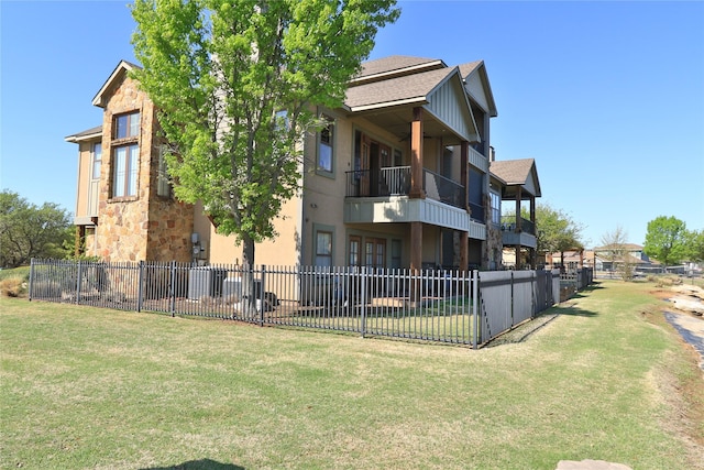 view of building exterior featuring fence