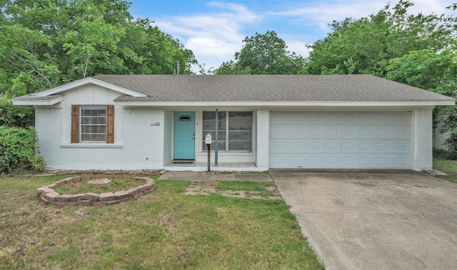 single story home featuring a front yard, brick siding, a shingled roof, concrete driveway, and an attached garage