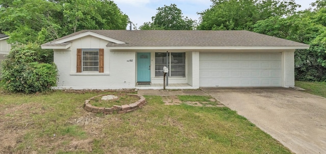 ranch-style house featuring roof with shingles, an attached garage, driveway, and a front yard