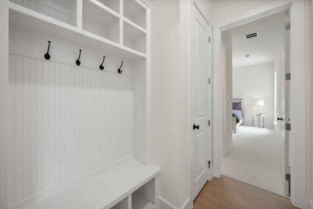 mudroom with visible vents and light wood-type flooring