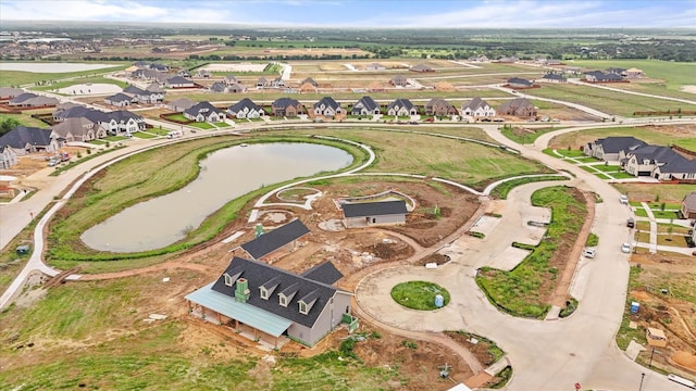 aerial view with a water view and a residential view