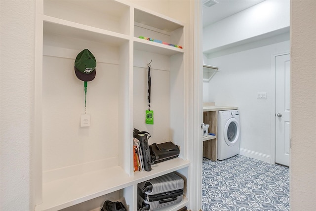 539 Point Vista Dr, Aledo, TX 76008 - laundry room featuring laundry area, baseboards, tile patterned flooring, and washing machine and clothes dryer
