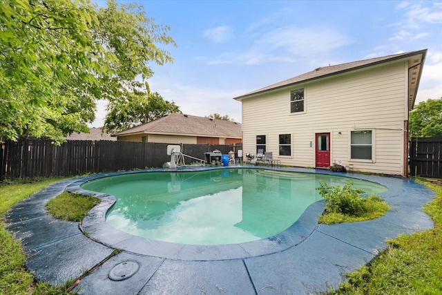 view of swimming pool featuring a fenced in pool and a fenced backyard