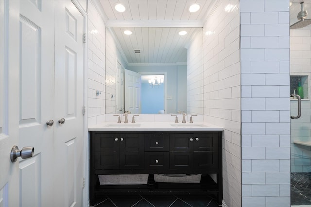 11330 Hillcrest Rd, Dallas, TX 75230 - full bathroom with recessed lighting, tile walls, a tile shower, and a sink