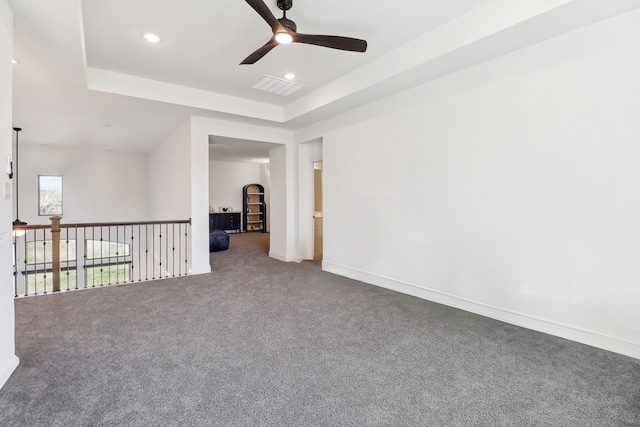 311 Misty Ln, Argyle, TX 76226 - empty room with visible vents, carpet floors, ceiling fan, recessed lighting, and a raised ceiling
