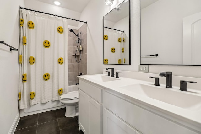 311 Misty Ln, Argyle, TX 76226 - bathroom featuring double vanity, a sink, tile patterned floors, and toilet