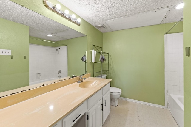 full bathroom with toilet, tile patterned floors, washtub / shower combination, and vanity