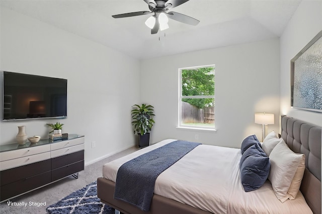 bedroom with baseboards, ceiling fan, and carpet