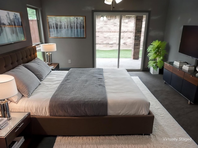 bedroom featuring access to outside and carpet floors