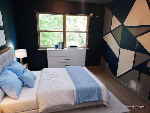 carpeted bedroom with baseboards