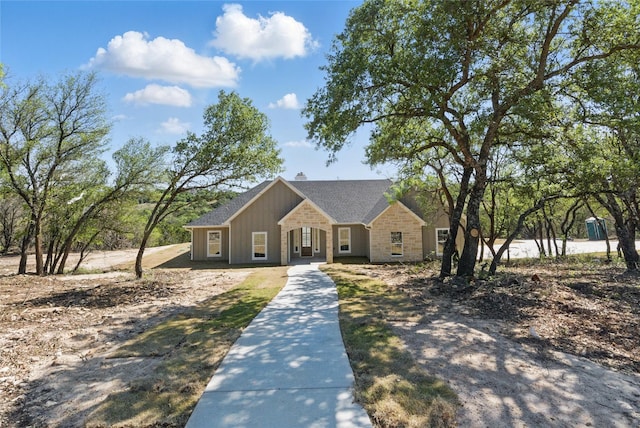 view of front of house featuring a shingled roof