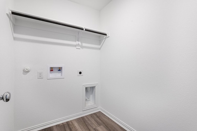washroom with laundry area, dark wood-style flooring, electric dryer hookup, hookup for a gas dryer, and hookup for a washing machine