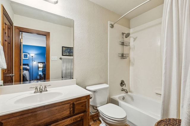 full bathroom featuring a textured wall, ensuite bath, vanity, toilet, and shower / bath combination with curtain