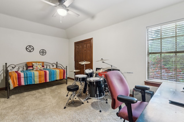 bedroom featuring baseboards, carpet, ceiling fan, and vaulted ceiling
