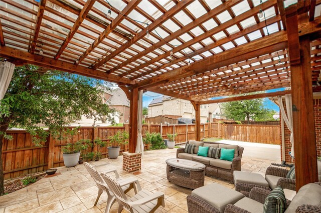 view of patio / terrace with a fenced backyard, a pergola, and outdoor lounge area