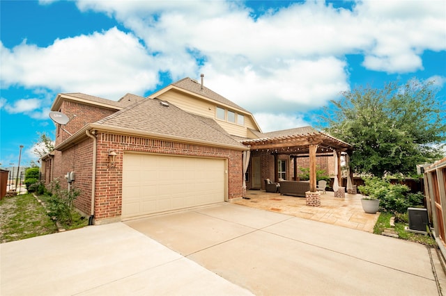 view of front of home with a pergola, an attached garage, brick siding, an outdoor living space, and concrete driveway