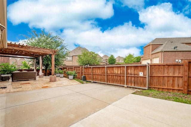 view of patio / terrace with a pergola, fence, and a residential view