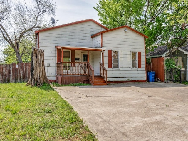 4942 Terry St, Dallas, TX 75223 - bungalow-style house with fence and covered porch