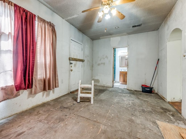 4942 Terry St, Dallas, TX 75223 - spare room with arched walkways, a ceiling fan, and visible vents