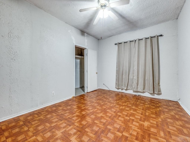 4942 Terry St, Dallas, TX 75223 - unfurnished room with a textured ceiling, ceiling fan, a textured wall, and baseboards