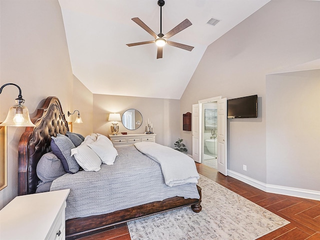 bedroom with baseboards, ensuite bathroom, dark wood-type flooring, high vaulted ceiling, and a ceiling fan