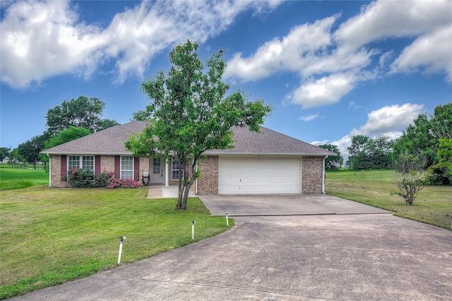 ranch-style house with a shingled roof, an attached garage, a front lawn, brick siding, and concrete driveway