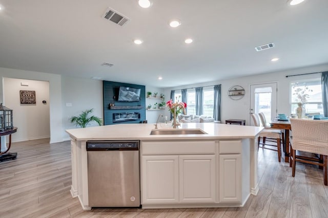 1016 Webb Ave, Aubrey, TX 76227 - kitchen with visible vents, a sink, dishwasher, and light countertops