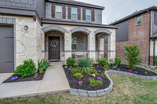 1016 Webb Ave, Aubrey, TX 76227 - entrance to property with brick siding, covered porch, and stone siding